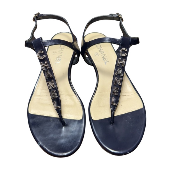 CHANEL Shoes - CHANEL BLACK Leather Logo T-Strap Sandals 39.5C